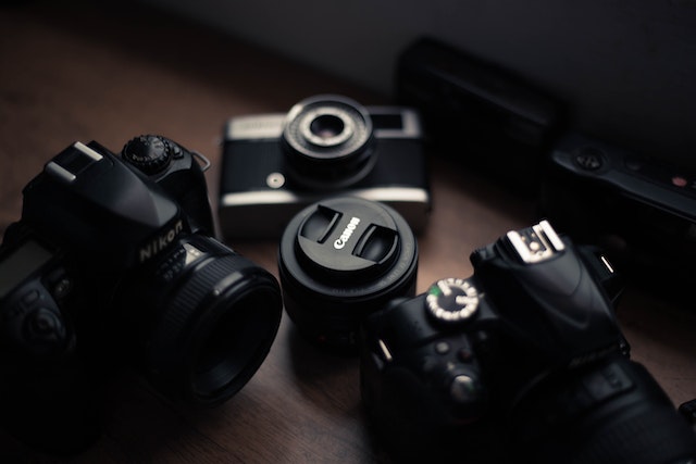 variety%20of%20photography%20cameras%20and%20lenses%20on%20a%20table variety%20of%20photography%20cameras%20and%20lenses%20on%20a%20table